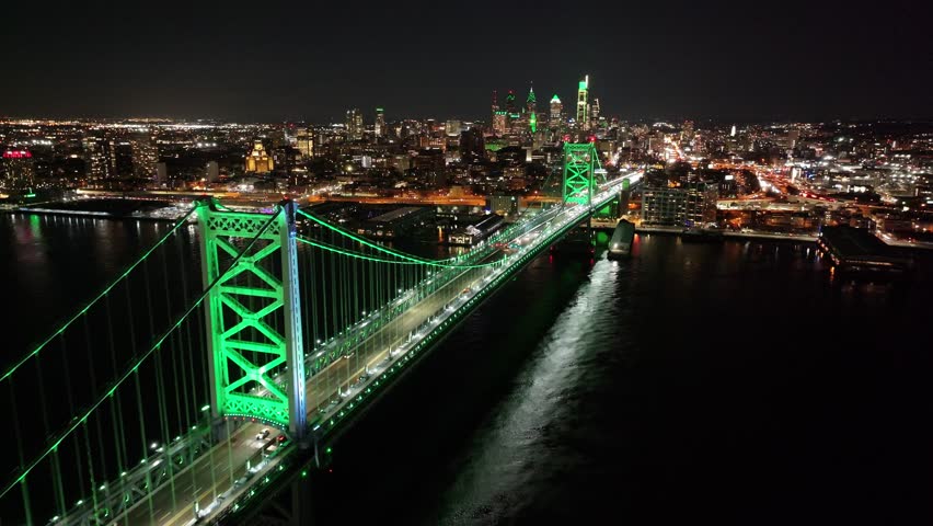 Cable Bridge At Philadelphia Pennsylvania United States. Powerful Landscape Of The Vehicles In A Famous Road . Night Street Downtown Cityscape. Night Panning Wide. Cities Of The World.