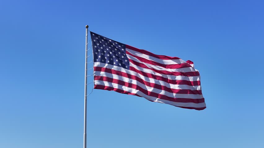American Flag At Saint Petersburg Florida United States. Stunning Scene Of National Flag Waving At Flagpole. Paradise Skyline Peaceful Vibrant. Paradise Sea. Saint Petersburg Florida.