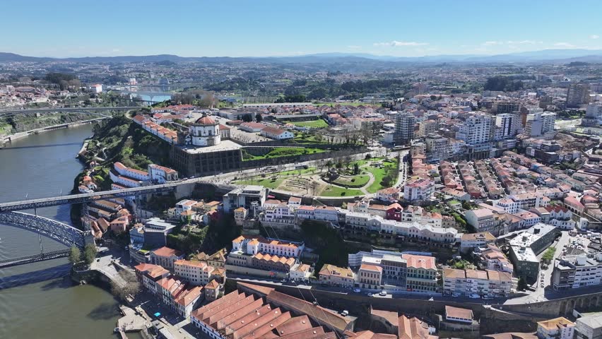 Morro Garden At Gaia District Of Porto Portugal. Drone Captures A Garden With Sidewalks Surrounded By Lush Trees. Metropole Landscape Company Building Beautiful. Company Building.