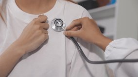 Homecare nursing service and elderly people cardiology healthcare. Close up of young hispanic female doctor nurse check mature caucasian man patient heartbeat using stethoscope during visit - Powered by Shutterstock - Get 15% off with code: PIKWIZARD15