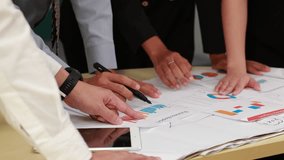 closeup hand Brainstorm :  Diverse Professionals Brainstorming on desk with Graphs, Infographics, AI, Big Data, Mindmapping. Diverse Asian Team Working Together  - Powered by Shutterstock - Get 15% off with code: PIKWIZARD15