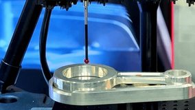 Close up automatic coordinate measurement machine (CMM) for inspection high precision engine part during working - Powered by Shutterstock - Get 15% off with code: PIKWIZARD15