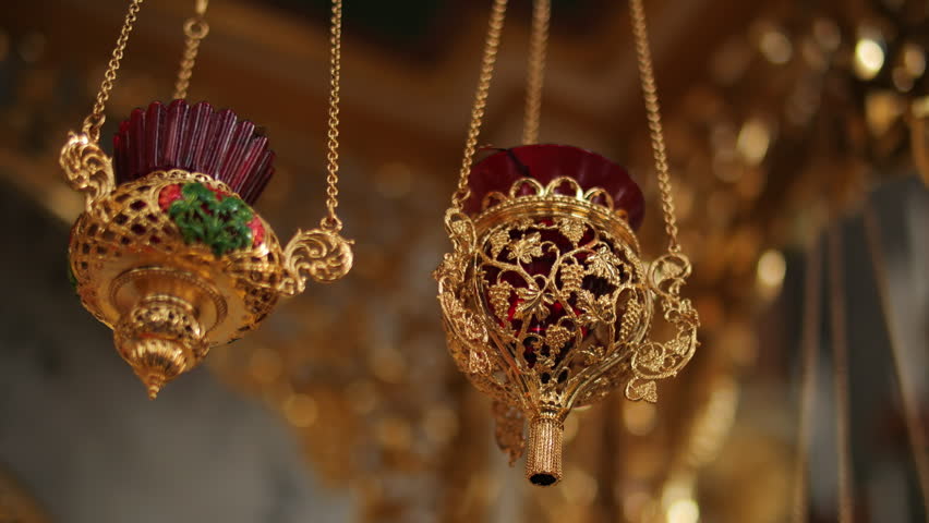 Ornate hanging lamps in Orthodox Christian church