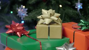 Festive Christmas Gifts with Colorful Bows Under a Decorated Tree in Cozy Holiday Setting - Powered by Shutterstock - Get 15% off with code: PIKWIZARD15