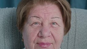 Close up of a senior woman's eyes, blinks her eyes, and smiles. Concept of treatment for vision, contact lenses and surgery - Powered by Shutterstock - Get 15% off with code: PIKWIZARD15