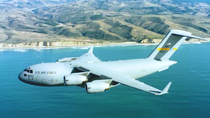 C-17 Globemaster aircraft flies calmly hovering in the sky