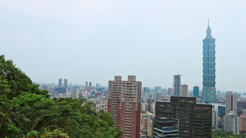 Taipei 101 building skyline famous tourist travel destination landmark in downtown of Taipei city, Taiwan from high elephant mountain view point city landscape