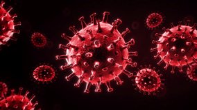 Red virus-like spheres glow and rotate in a static close-up. High contrast scientific visual showing particles in motion. - Powered by Shutterstock - Get 15% off with code: PIKWIZARD15