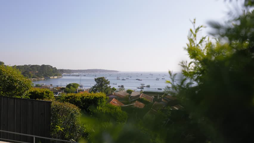 Cap-Ferret, France. Boats seen from an oyster village on the Bay of Arcachon