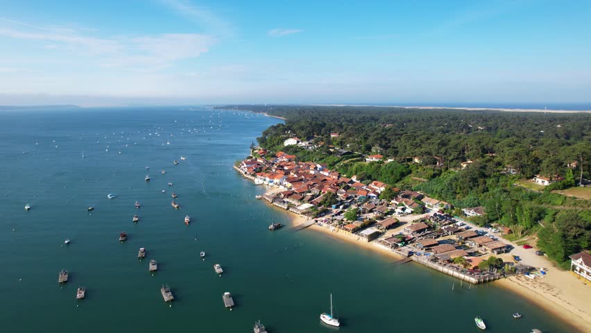Cap-Ferret, France. Boats seen from an oyster village on the Bay of Arcachon