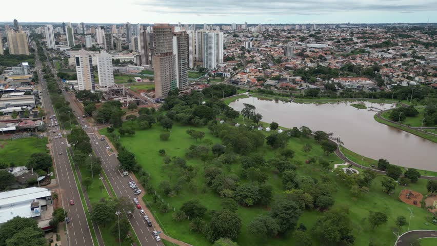 Flyover lush Indigenous Nations Park lagoon in Campo Grande, Brazil