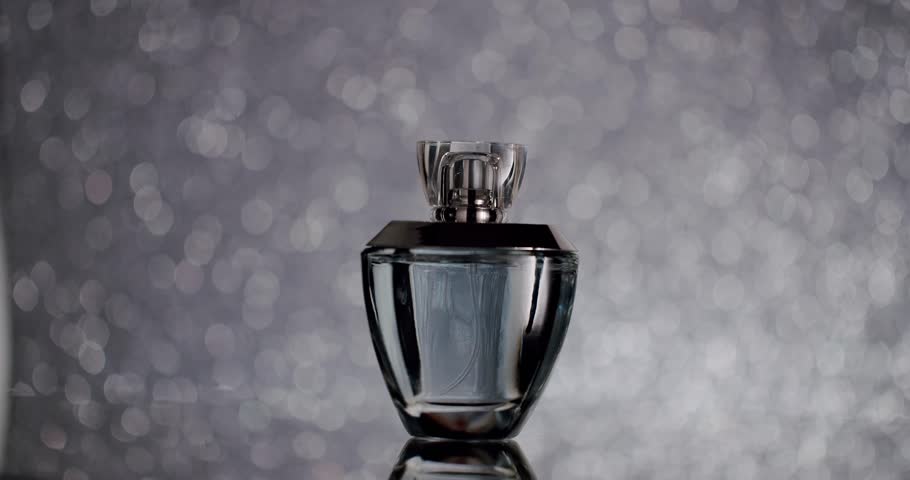 Elegant perfume bottle displayed against a stylish bokeh background, representing luxury, beauty, and sophistication in fragrance packaging. Elegant Perfume Bottle