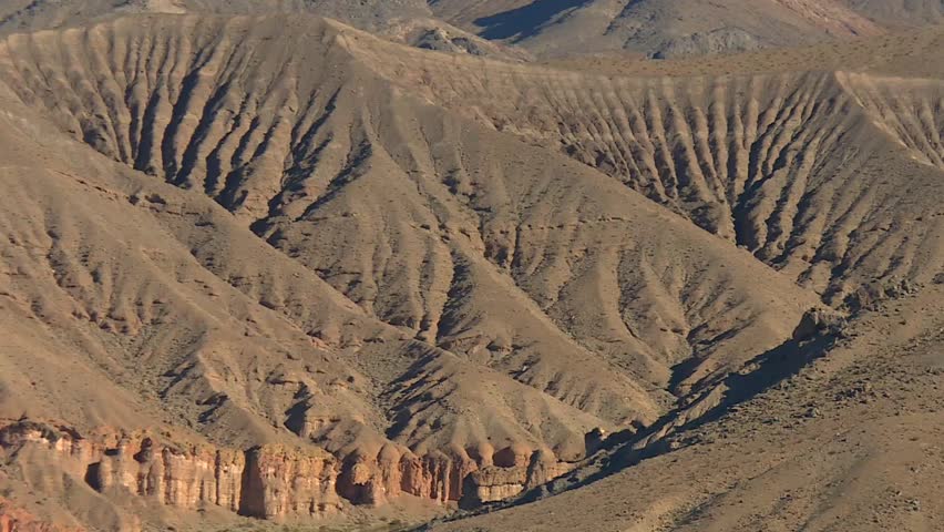 Sandstone Mountains In The Arid Deserts Of Death Valley National Park, USA. Aerial Shot
