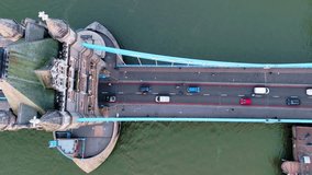 Pedestrians and traffic crossing iconic Tower Bridge, aerial panning - Powered by Shutterstock - Get 15% off with code: PIKWIZARD15