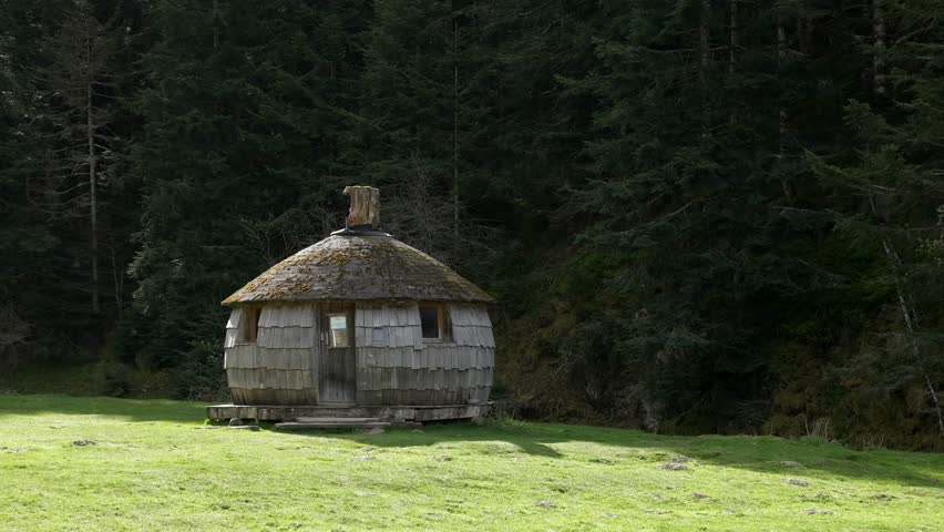 Wooden cabin located on the shore of Lac de Payolle, a touristic artificial lake located in the communes of Campan and Arreau of the Hautes-Pyrénées department.