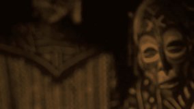 Dogon ritual dance around fire at night with mask approaching camera - Powered by Shutterstock - Get 15% off with code: PIKWIZARD15