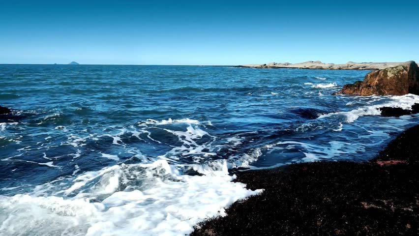 Ocean Waves Crashing on Rocky Shore, Coastal Landscape