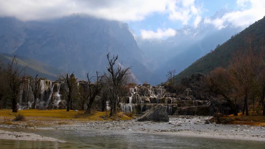 Majestic Mountain Landscape with River and Autumnal Trees