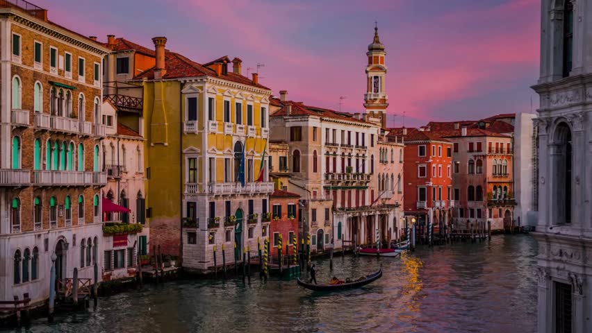 Venetian Canal at Sunset: Colorful Buildings and Gondola