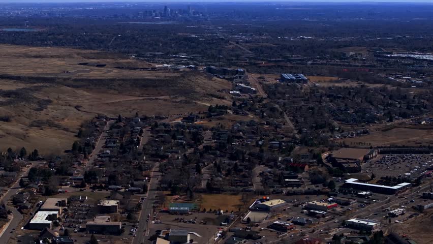 Lookout Mountain Golden Downtown Denver cityscape from North Table Mesa aerial drone Colorado daytime winter sunny clouds neighborhood Front Range Rocky Mountains Arvada Lakewood forward pan up motion