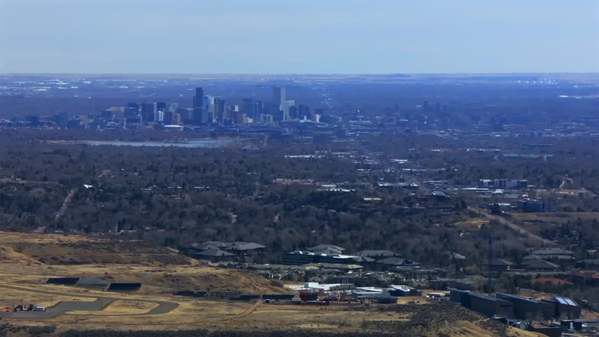 Lookout Mountain Golden Downtown Denver cityscape from North Table Mesa aerial drone Colorado daytime winter sunny clouds neighborhood Front Range Rocky Mountains Arvada Lakewood parallax right motion
