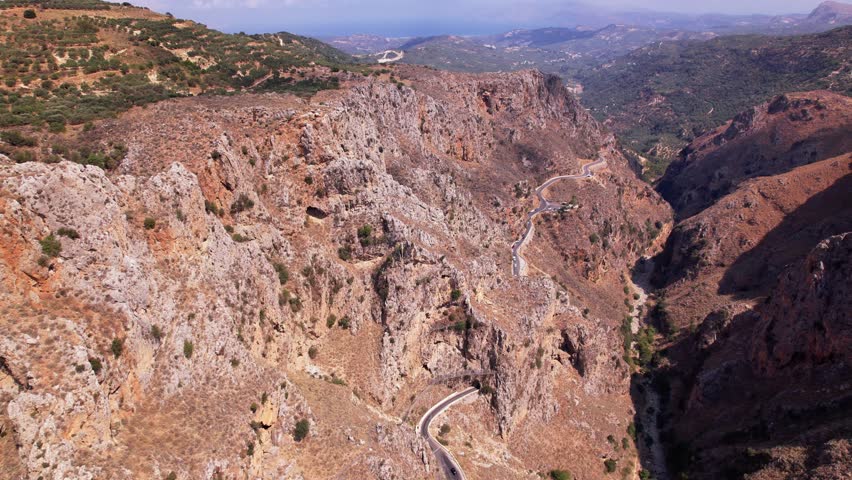 Stunning aerial view of Crete breathtaking landscape showing mountains and winding roads