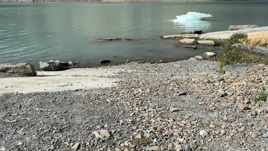 Majestic view of Grinnell Glacier and beautiful lake in Glacier National Park