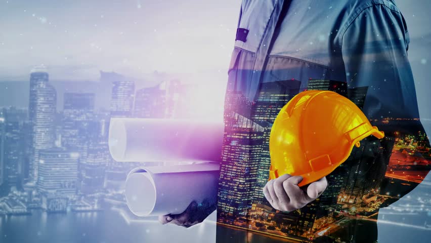 Future building construction and inventive engineering project concept with HUD hologram graphic design. Building engineer, architect people or construction worker works with modern civil technology.