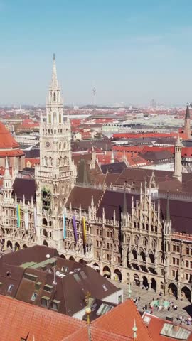 New Town Hall (Neues Rathaus) And Marienplatz in Munich, Bavaria, Germany. - aerial vertical shot