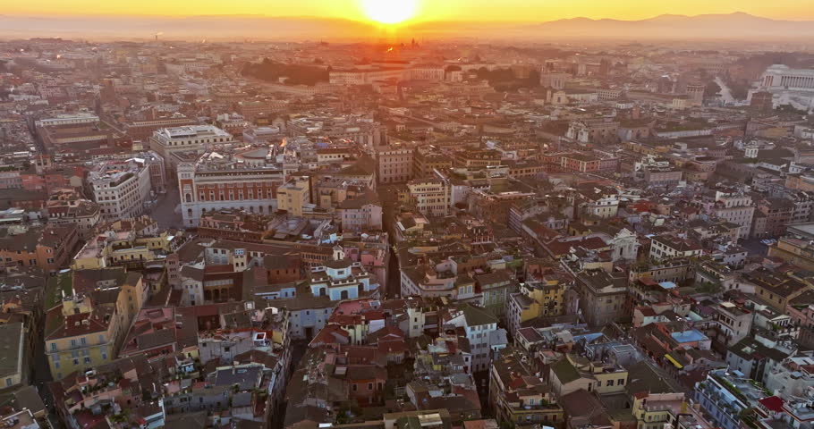 Aerial view rooftops of the city of Rome, Italy. Establishing shot of the capital