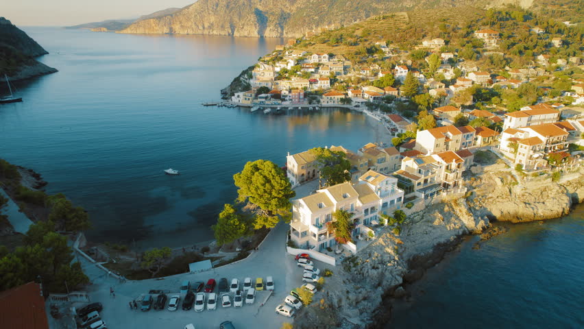 Picturesque village Assos by the turquoise sea at sunset in Kefalonia Island Greece