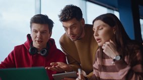 Team managers quarrelling at videocall frustrated business problem closeup. Worried group colleagues talking to laptop webcam nervously. Stressed coworkers complaining on project failure in office. - Powered by Shutterstock - Get 15% off with code: PIKWIZARD15