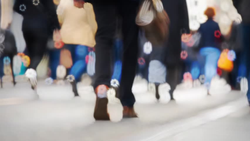Crowded avenue. New York City. US. People walking in busy street of Manhattan. Traffic passing by. 