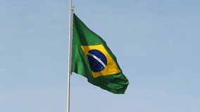 Brazilian national flag waving in the wind with vibrant green, yellow and blue colors, representing national pride and unity of Brazil. - Powered by Shutterstock - Get 15% off with code: PIKWIZARD15