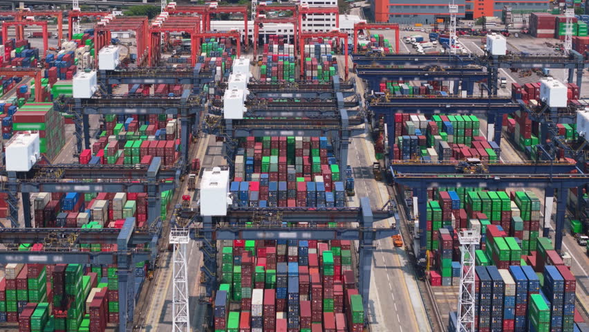 Large Container Terminal With Colorful Shipping Containers and Cranes Operating in a Hong Kong Logistics Hub, Symbolizing International Trade and Global Supply Chains. Container Terminal Handling