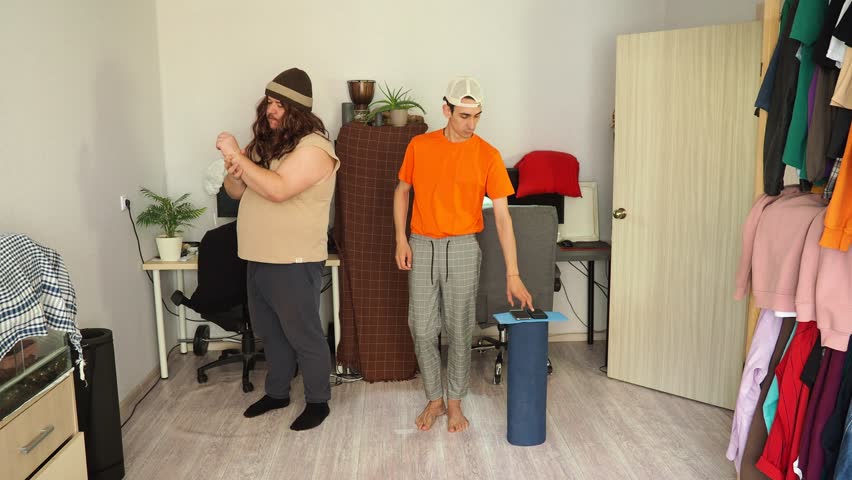 Two men doing fitness at home.