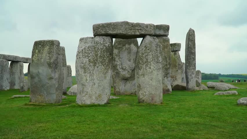 Stonehenge’s massive standing stones captured in a frontal shot, highlighting the symmetrical layout and prehistoric architecture on the grassy plains of Wiltshire.