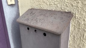 metal mailbox closed with a lock - Powered by Shutterstock - Get 15% off with code: PIKWIZARD15