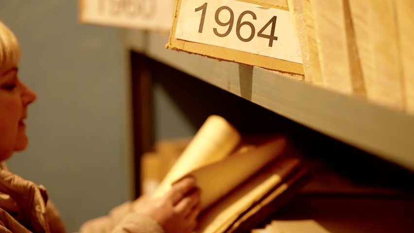 Old Document In Archive Department. Archival Material. Bookkeeping File Shelf. 
Archive Texts In Films And Reports. Highly Classified Documents. National Archives Records. Old Secret Archival Document