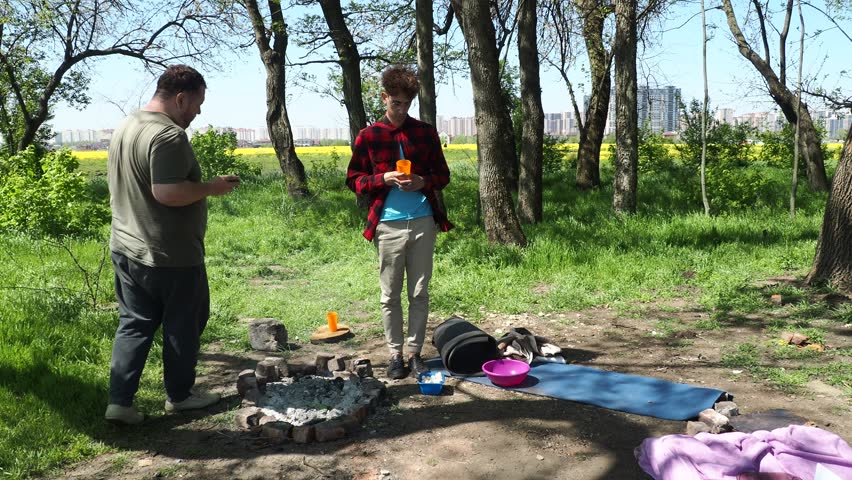 Picnic in the old park. Two friends in nature.