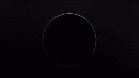 3d animated geometric background of spinning glass circle. Rainbow colors reflection glass. Abstract glass effect and circle motion movement on black background. 3d 4k seamless looped video - Powered by Shutterstock - Get 15% off with code: PIKWIZARD15