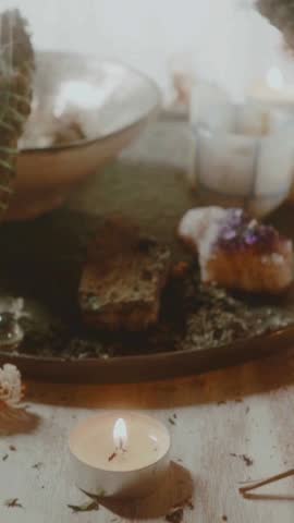 burning aromatherapy incense. camera movement. motion blur. vertical video.