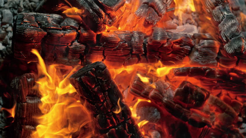 Super Slow Motion of Burning Fireplace with Burned Logs, Embers and Sparks in 1000fps.