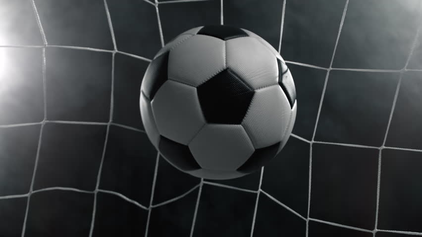 Super Slow Motion Soccer Ball Hitting Goal Net on Black Background, 1000fps.