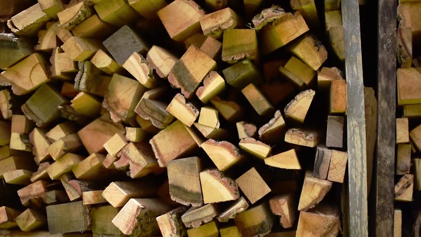 chopped firewood prepared for the winter, horizontal video