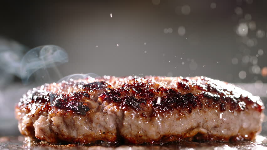 Fried vegetarian cutlets made from vegetable protein. Cinematic advertising plant-based imitation burger cooking. Mouthwatering pan-fried vegetable cutlets perfect for high protein vegetarian diet