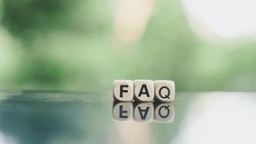 se up FAQ wooden text block and magnifying glass on wood table, Frequently Asked Questions - Powered by Shutterstock - Get 15% off with code: PIKWIZARD15