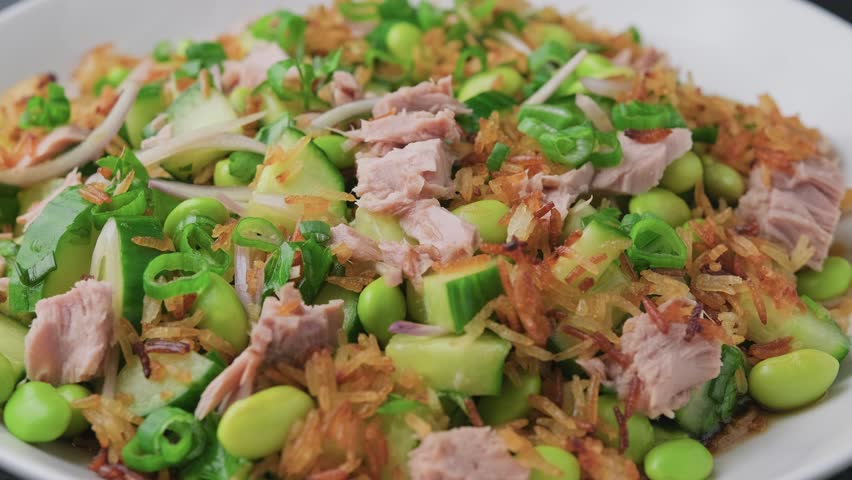 Crispy Rice Tuna Salad with edamame beans, cucumber, onion