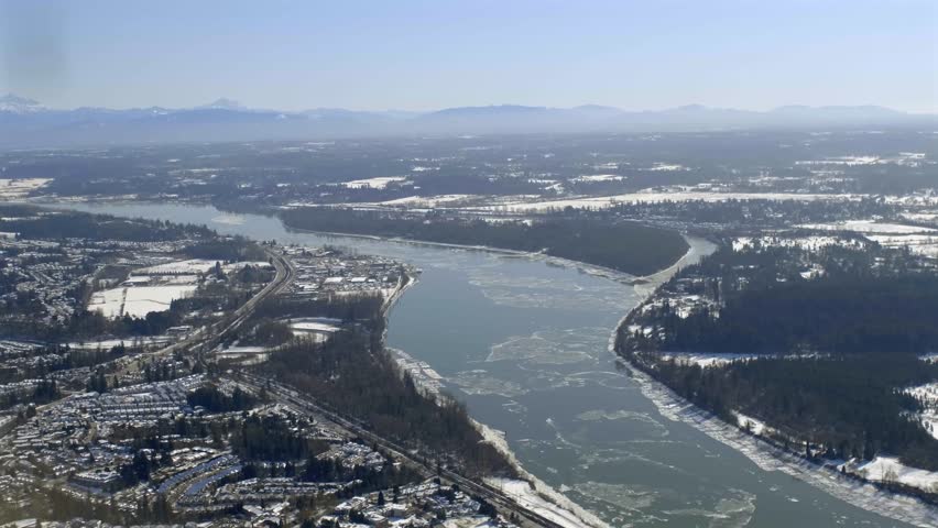 Panoramic View Of Fraser River During Winter In British Columbia, Canada. Aerial Wide Shot