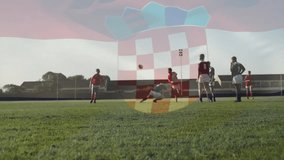 Red-jerseyed rugby player in training approaching ball kicking it for teammate catch then tackle. Athletes, competition, action, sports, teamwork, outdoor, intensity - Powered by Shutterstock - Get 15% off with code: PIKWIZARD15